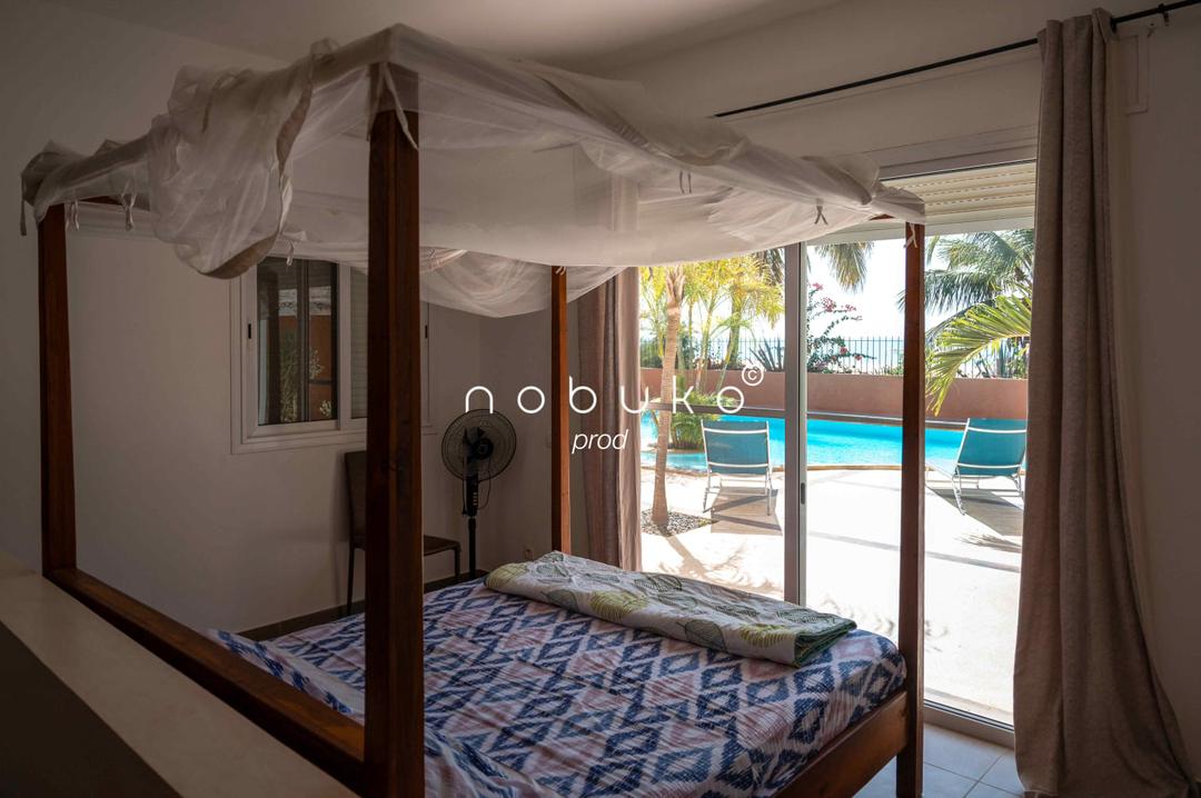 Chambre avec vue piscine à Ngaparou